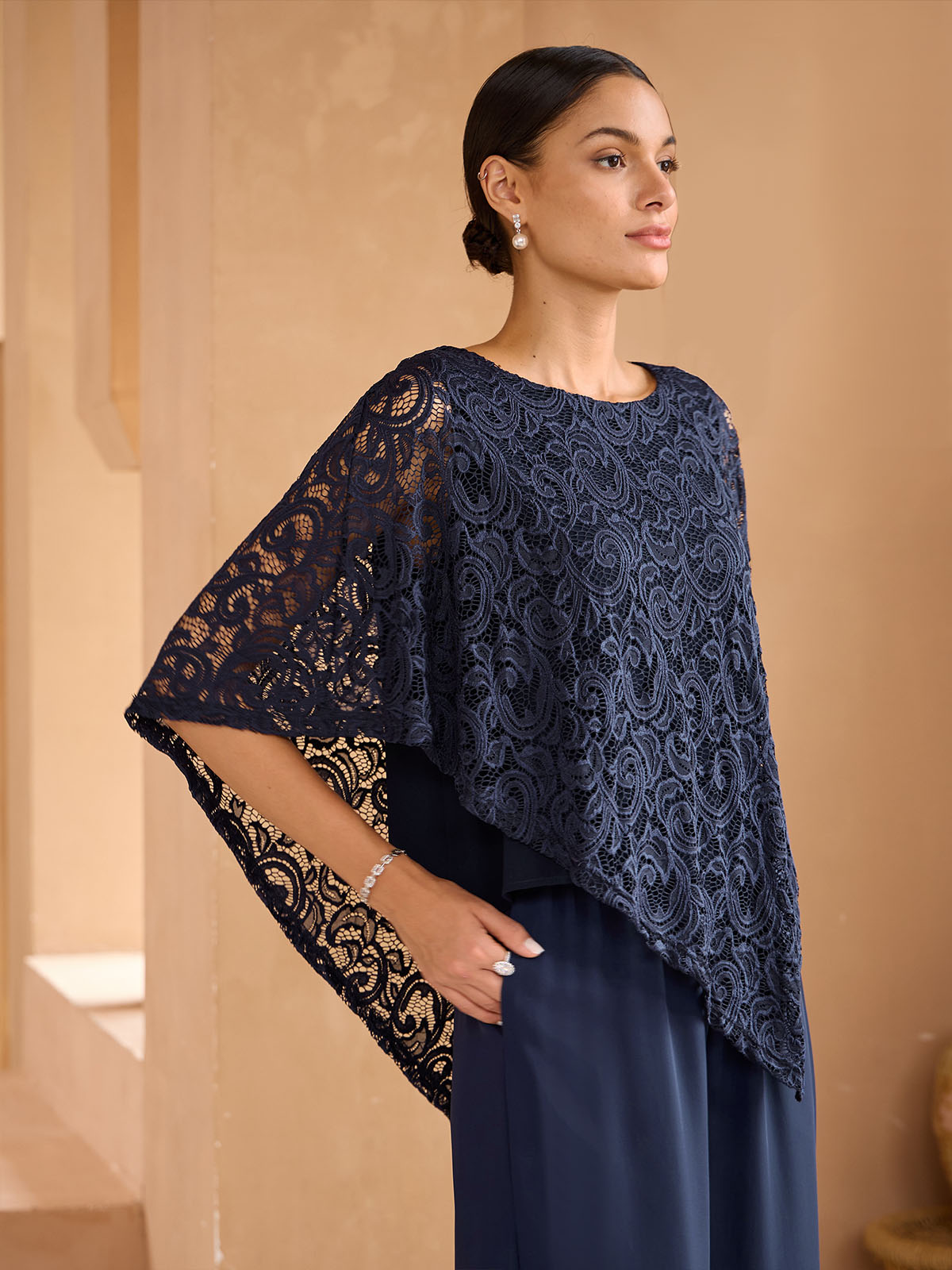 Elegante kanten top met vleermuismouwen