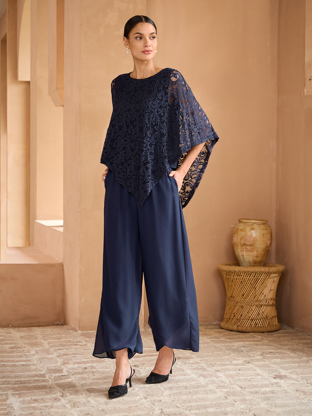 Elegante kanten top met vleermuismouwen