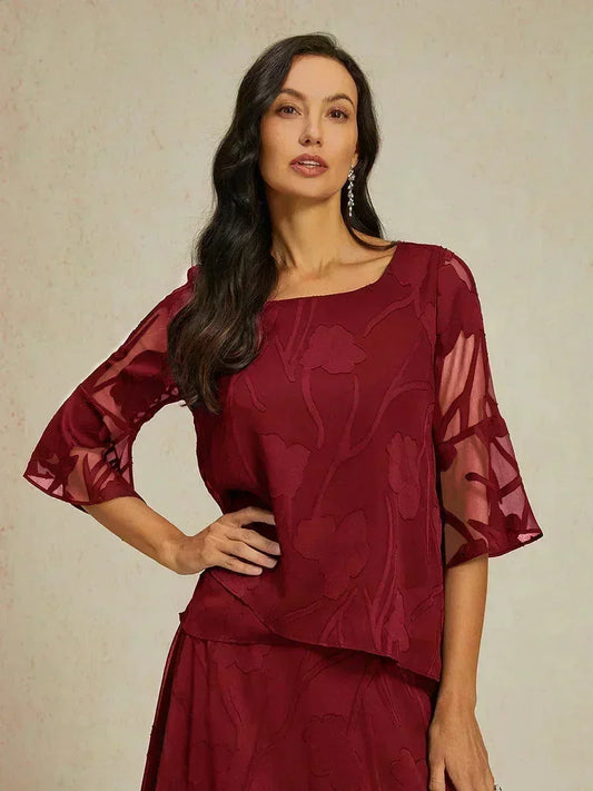 Elegante Chiffonbluse mit asymmetrischem Saum
