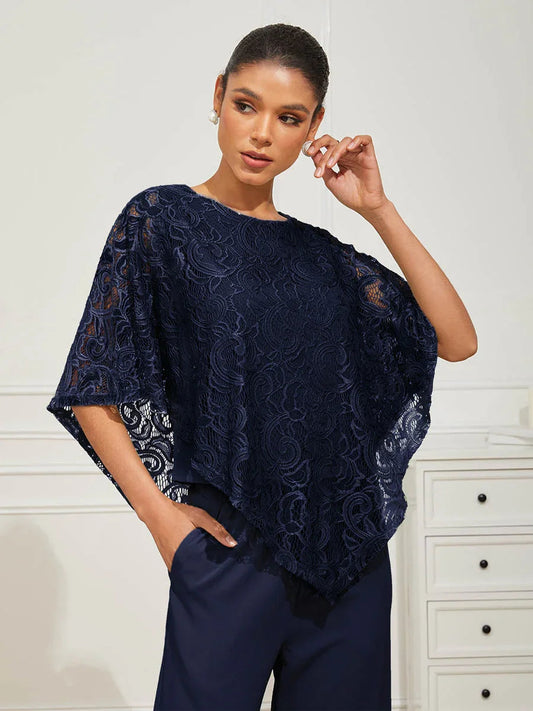 Elegant bluse med flaggermusærmer i blonder