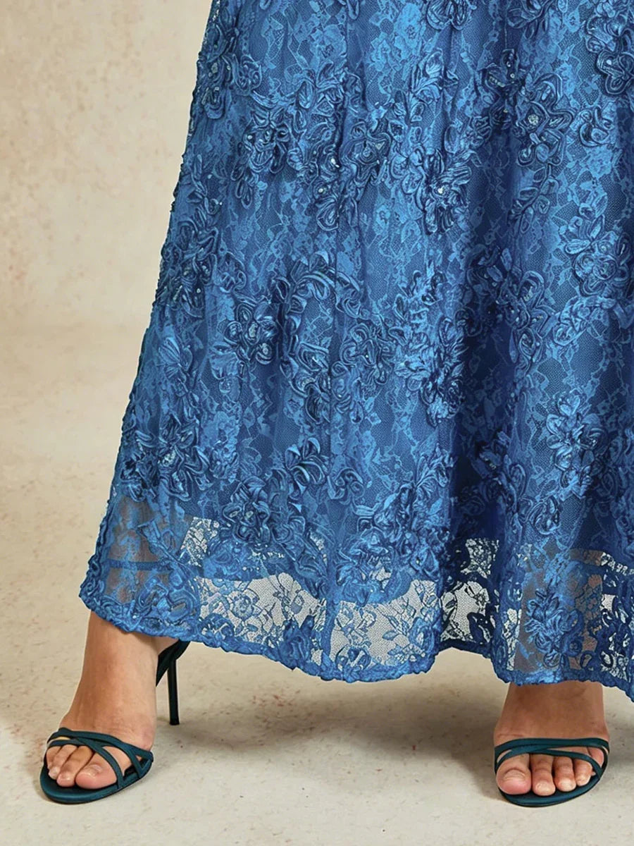 Abito a linea A con pizzo a rosetta e decorazioni in paillettes