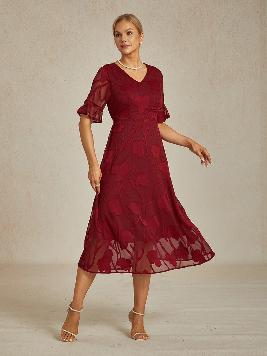 Maxikleid mit Rüschen und flatternder Spitze