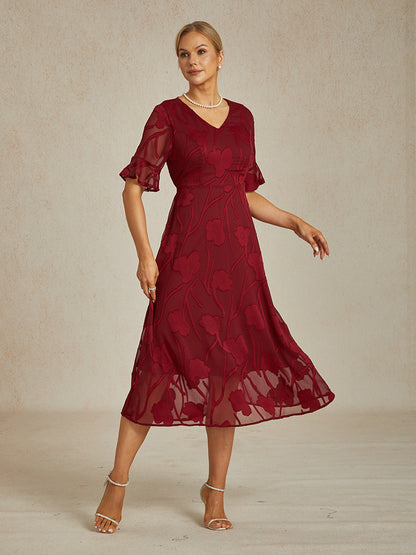 Maxikleid mit Rüschen und flatternder Spitze